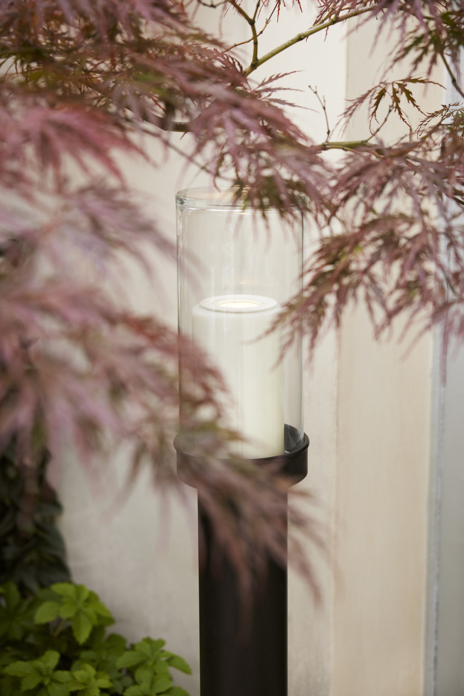 Exterior electric standing candle unit