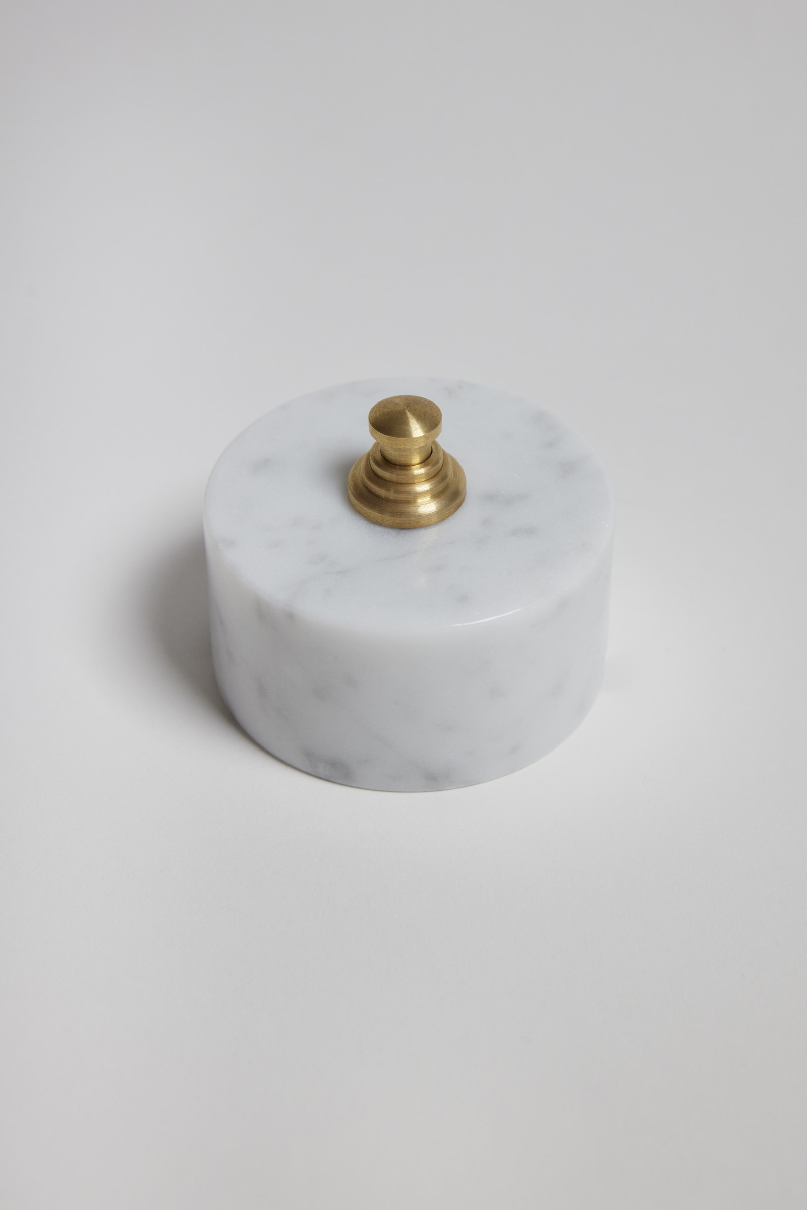 2" on/off Floor switch in white Carrara Marble